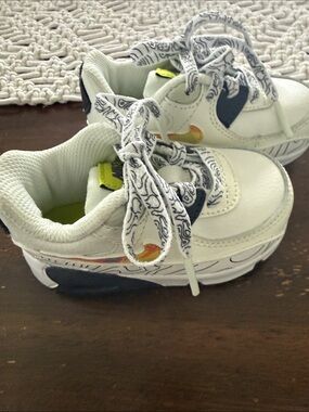 Nike Kids White Trainer Sneakers with Rainbow Accent